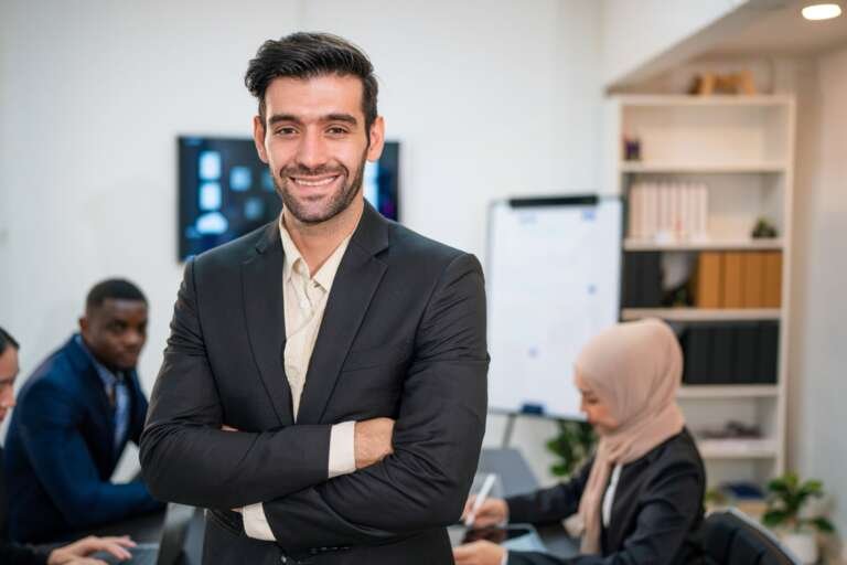 successful-businessman-working-and-looking-camera-2026-01-05-00-24-18-utc