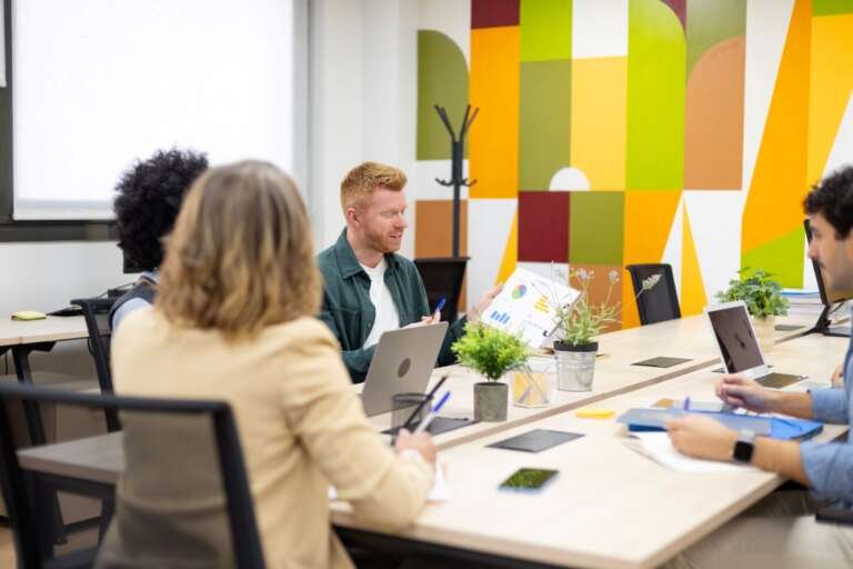 business-colleagues-collaborating-on-data-analysis-2026-03-26-23-22-01-utc